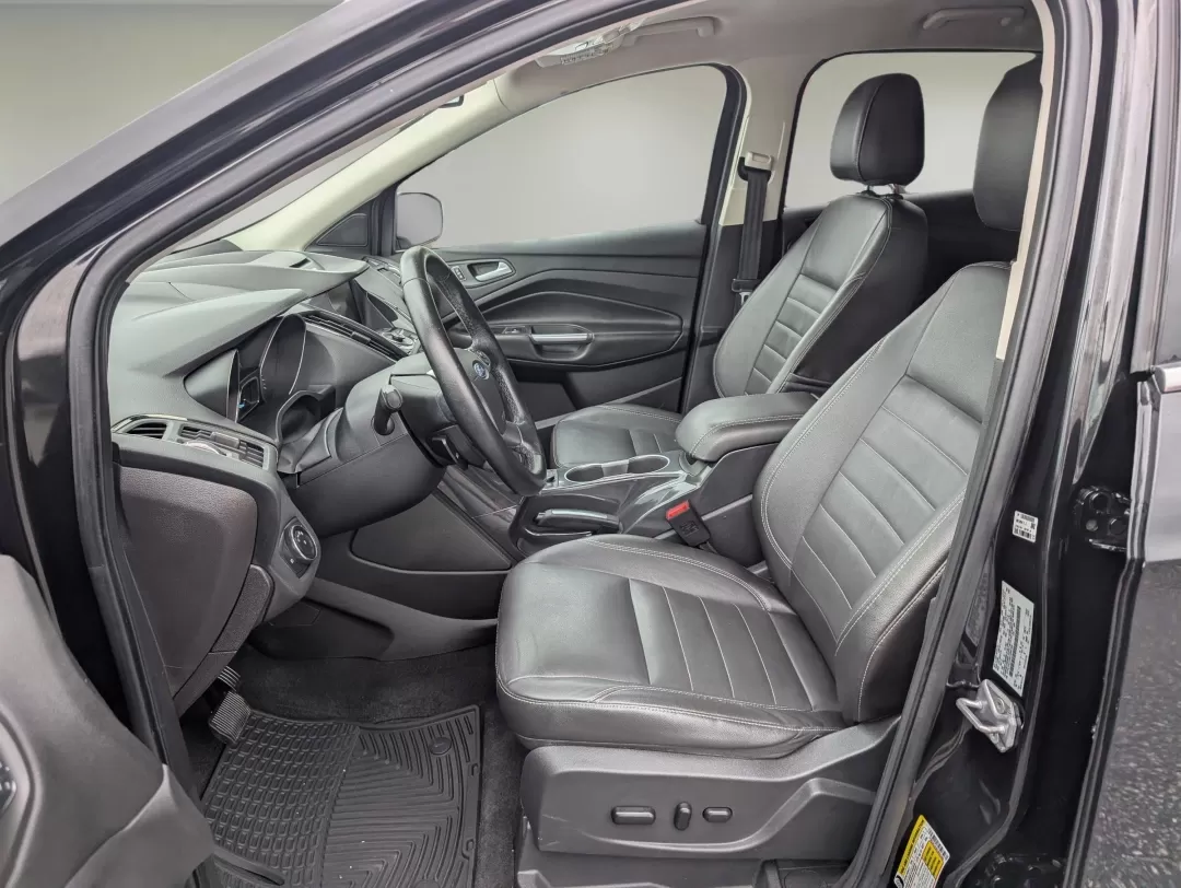 2014 Ford Escape Titanium (1FMCU0JX9EU) with an Other engine, located at 3959 U.S. 80 W, Phenix City, AL, 36870, (334) 297-4885, 32.469296, -85.135185 - Discover the perfect balance of style, comfort, and versatility with the 2014 Ford Escape Titanium available at Gils Auto in Phenix City, AL. Whether you're a busy parent juggling activities, a commuter navigating the daily grind, or an adventure-seeker ready to hit the road, this SUV is designed to - Photo#9