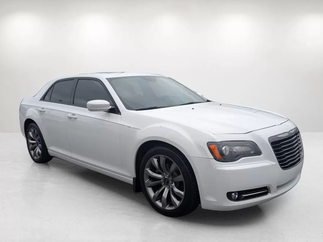 2014 /Ambassador Blue/Black Chrysler 300 300S (2C3CCABG3EH) with an Other engine, located at 3959 U.S. 80 W, Phenix City, AL, 36870, (334) 297-4885, 32.469296, -85.135185 - **Experience Luxury and Performance with the 2014 Chrysler 300S at Gils Auto!**<br /> <br /> Imagine cruising through Phenix City, AL, in a stylish sedan that seamlessly blends luxury with powerful performance-a vehicle that's perfect for both your daily commute and spontaneous weekend adventures. T - Photo#2