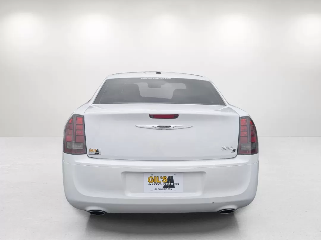 2014 /Ambassador Blue/Black Chrysler 300 300S (2C3CCABG3EH) with an Other engine, located at 3959 U.S. 80 W, Phenix City, AL, 36870, (334) 297-4885, 32.469296, -85.135185 - **Experience Luxury and Performance with the 2014 Chrysler 300S at Gils Auto!**<br /> <br /> Imagine cruising through Phenix City, AL, in a stylish sedan that seamlessly blends luxury with powerful performance-a vehicle that's perfect for both your daily commute and spontaneous weekend adventures. T - Photo#5