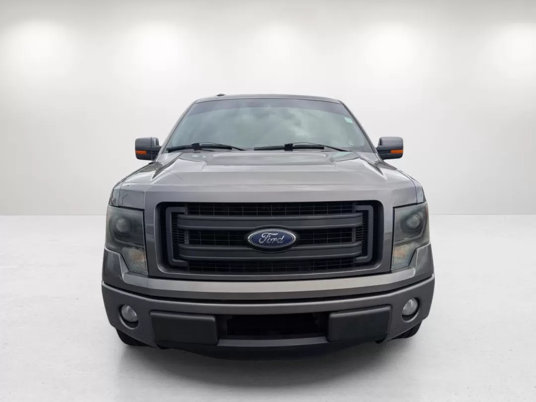 2013 Ford F-150 FX2 (1FTFW1CT2DF) with an Other engine, located at 1430 Gateway Drive, Opelika, AL, 36801, (334) 239-0944, 32.637871, -85.409790 - **Discover the Ultimate Pickup Experience with the 2013 Ford F-150 at Gils Auto in Phenix City, AL!**<br /> <br /> Are you ready to elevate your adventures, whether they involve weekend getaways, home improvement projects, or just navigating your daily commute? The 2013 Ford F-150 is the perfect sol - Photo#1