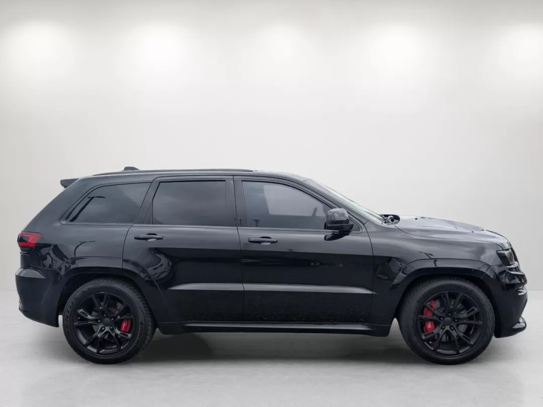 2015 /Black Jeep Grand Cherokee SRT (1C4RJFDJXFC) with an Other engine, located at 1430 Gateway Drive, Opelika, AL, 36801, (334) 239-0944, 32.637871, -85.409790 - **Elevate Your Adventures with the 2015 Jeep Grand Cherokee SRT at Gils Auto!**<br /> <br /> Are you ready to take your outdoor adventures to the next level? Whether it's cruising along the Chattahoochee River, tackling rugged terrains at nearby hiking trails, or simply enjoying a comfortable ride t - Photo#3
