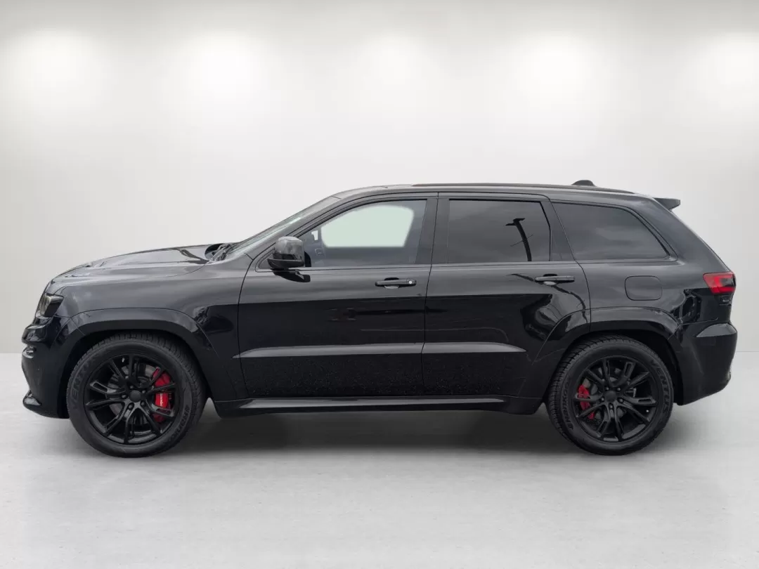 2015 /Black Jeep Grand Cherokee SRT (1C4RJFDJXFC) with an Other engine, located at 1430 Gateway Drive, Opelika, AL, 36801, (334) 239-0944, 32.637871, -85.409790 - **Elevate Your Adventures with the 2015 Jeep Grand Cherokee SRT at Gils Auto!**<br /> <br /> Are you ready to take your outdoor adventures to the next level? Whether it's cruising along the Chattahoochee River, tackling rugged terrains at nearby hiking trails, or simply enjoying a comfortable ride t - Photo#7