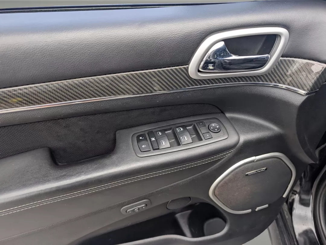 2015 /Black Jeep Grand Cherokee SRT (1C4RJFDJXFC) with an Other engine, located at 1430 Gateway Drive, Opelika, AL, 36801, (334) 239-0944, 32.637871, -85.409790 - **Elevate Your Adventures with the 2015 Jeep Grand Cherokee SRT at Gils Auto!**<br /> <br /> Are you ready to take your outdoor adventures to the next level? Whether it's cruising along the Chattahoochee River, tackling rugged terrains at nearby hiking trails, or simply enjoying a comfortable ride t - Photo#8