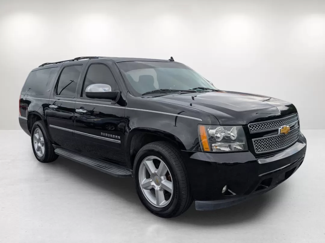 2014 /Ebony Chevrolet Suburban LTZ (1GNSCKE00ER) with an Other engine, located at 3959 U.S. 80 W, Phenix City, AL, 36870, (334) 297-4885, 32.469296, -85.135185 - Experience the ultimate in family adventure with the 2014 Chevrolet Suburban LTZ, available now at Gils Auto in Phenix City, Alabama. This spacious SUV is designed for those who seek comfort and style, making it perfect for growing families, weekend getaways, or long commutes. With ample seating for - Photo#2