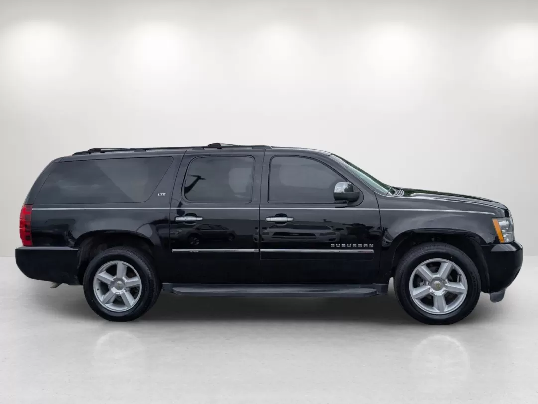 2014 /Ebony Chevrolet Suburban LTZ (1GNSCKE00ER) with an Other engine, located at 3959 U.S. 80 W, Phenix City, AL, 36870, (334) 297-4885, 32.469296, -85.135185 - Experience the ultimate in family adventure with the 2014 Chevrolet Suburban LTZ, available now at Gils Auto in Phenix City, Alabama. This spacious SUV is designed for those who seek comfort and style, making it perfect for growing families, weekend getaways, or long commutes. With ample seating for - Photo#3