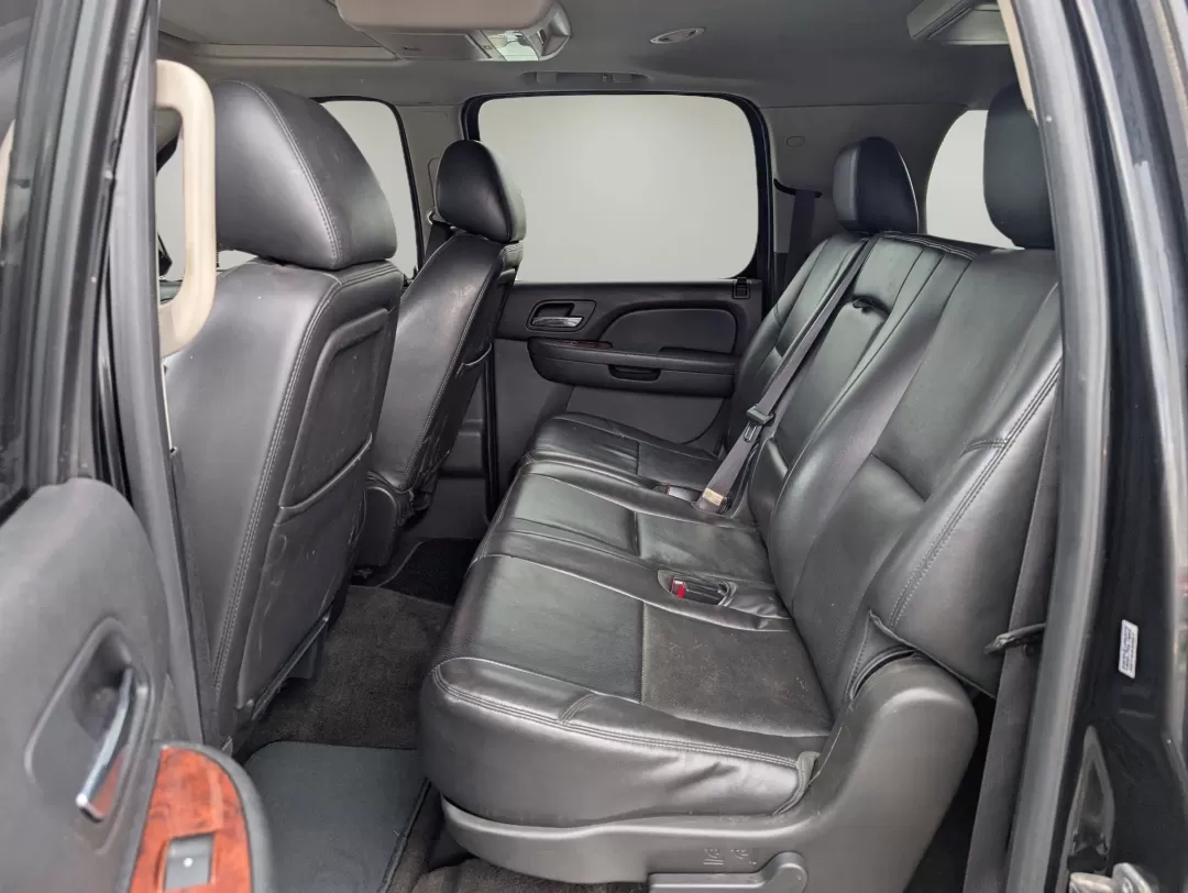 2014 /Ebony Chevrolet Suburban LTZ (1GNSCKE00ER) with an Other engine, located at 3959 U.S. 80 W, Phenix City, AL, 36870, (334) 297-4885, 32.469296, -85.135185 - Experience the ultimate in family adventure with the 2014 Chevrolet Suburban LTZ, available now at Gils Auto in Phenix City, Alabama. This spacious SUV is designed for those who seek comfort and style, making it perfect for growing families, weekend getaways, or long commutes. With ample seating for - Photo#10