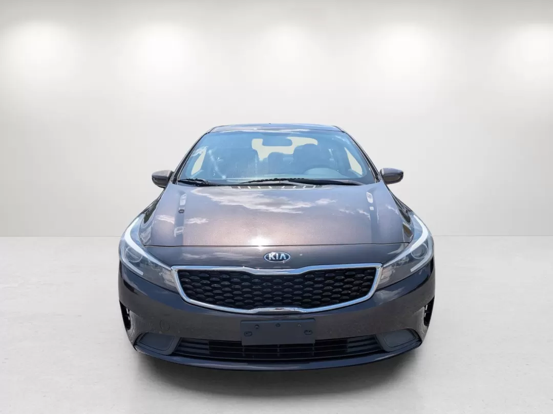 2018 /Black Kia Forte LX (3KPFK4A7XJE) with an Other engine, located at 7000 Northlake Connector, Columbus, GA, 31904, (706) 987-8085, 32.524975, -84.978134 - Are you on the hunt for a reliable vehicle that perfectly balances comfort, style, and affordability? Look no further than this stunning 2018 Kia Forte LX, available now at Gils Auto in Phenix City, Alabama. Whether you're commuting to work, running errands, or planning a weekend getaway, this sedan - Photo#1