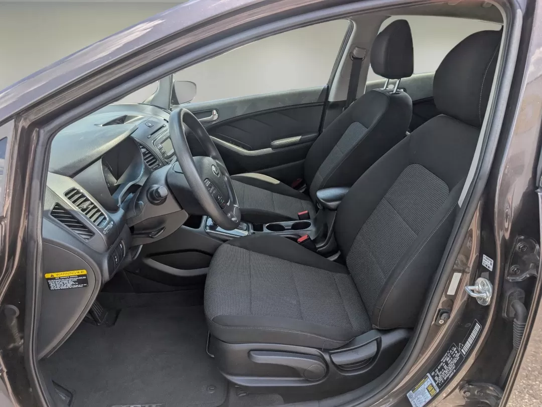 2018 /Black Kia Forte LX (3KPFK4A7XJE) with an Other engine, located at 7000 Northlake Connector, Columbus, GA, 31904, (706) 987-8085, 32.524975, -84.978134 - Are you on the hunt for a reliable vehicle that perfectly balances comfort, style, and affordability? Look no further than this stunning 2018 Kia Forte LX, available now at Gils Auto in Phenix City, Alabama. Whether you're commuting to work, running errands, or planning a weekend getaway, this sedan - Photo#9