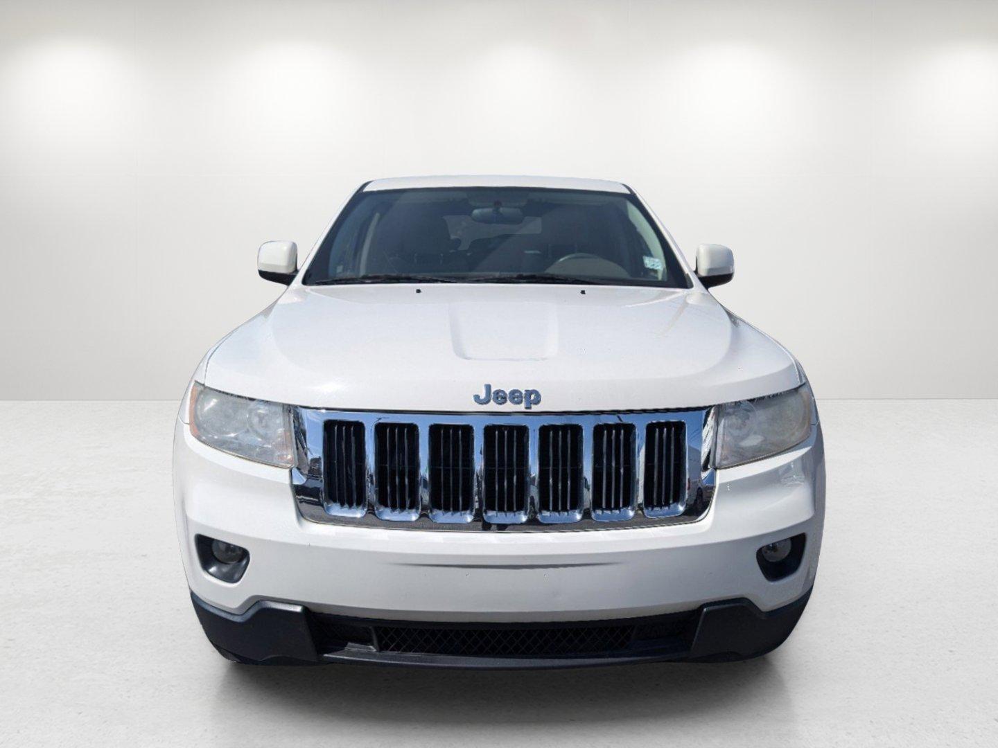 2012 Stone White /Dark Graystone/Medium Graystone Jeep Grand Cherokee Laredo (1C4RJFAG1CC) with an Gas/Ethanol V6 3.6L/220 engine, 5-Speed Automatic transmission, located at 804 22nd Ave, Phenix City, AL, 36870, (334) 297-1860, 32.484749, -85.024475 - 2012 Jeep Grand Cherokee Laredo - Photo#1