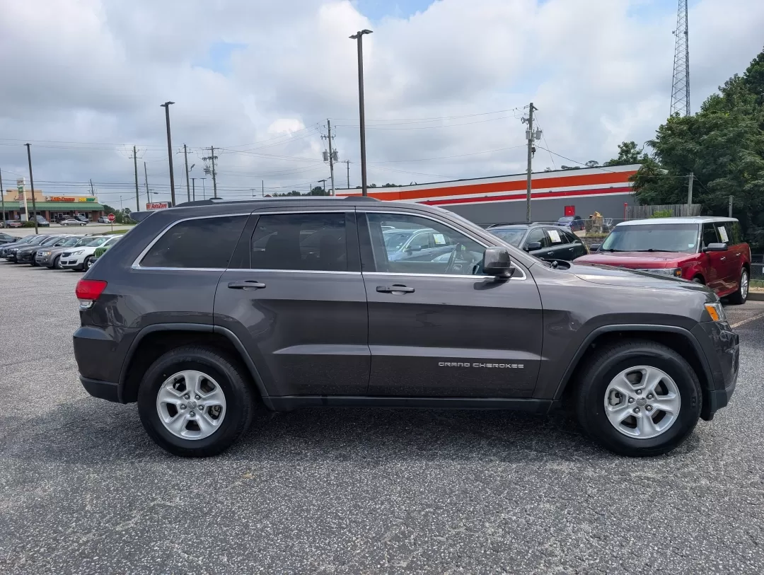 2015 /Black Jeep Grand Cherokee Laredo (1C4RJEAG9FC) with an Other engine, located at 3959 U.S. 80 W, Phenix City, AL, 36870, (334) 297-4885, 32.469296, -85.135185 - **Unleash Your Adventurous Spirit with This 2015 Jeep Grand Cherokee Laredo!**<br /> <br /> Are you ready to elevate your lifestyle and embark on unforgettable journeys? The 2015 Jeep Grand Cherokee Laredo is not just a vehicle; it's an experience waiting to happen. Designed for those who crave adve - Photo#3