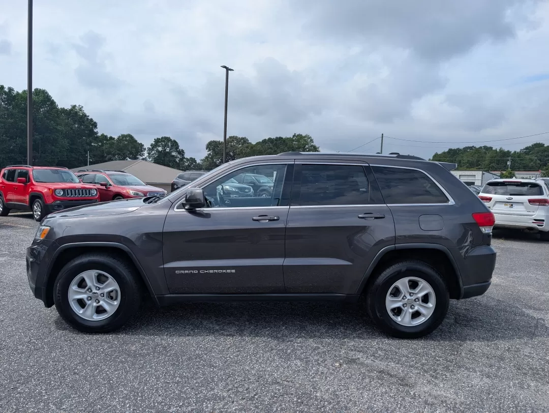2015 /Black Jeep Grand Cherokee Laredo (1C4RJEAG9FC) with an Other engine, located at 3959 U.S. 80 W, Phenix City, AL, 36870, (334) 297-4885, 32.469296, -85.135185 - **Unleash Your Adventurous Spirit with This 2015 Jeep Grand Cherokee Laredo!**<br /> <br /> Are you ready to elevate your lifestyle and embark on unforgettable journeys? The 2015 Jeep Grand Cherokee Laredo is not just a vehicle; it's an experience waiting to happen. Designed for those who crave adve - Photo#7