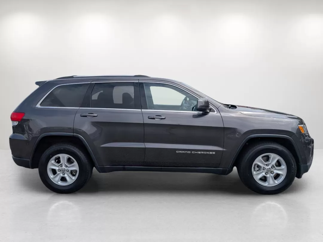 2015 /Black Jeep Grand Cherokee Laredo (1C4RJEAG9FC) with an Other engine, located at 3959 U.S. 80 W, Phenix City, AL, 36870, (334) 297-4885, 32.469296, -85.135185 - **Unleash Your Adventurous Spirit with This 2015 Jeep Grand Cherokee Laredo!**<br /> <br /> Are you ready to elevate your lifestyle and embark on unforgettable journeys? The 2015 Jeep Grand Cherokee Laredo is not just a vehicle; it's an experience waiting to happen. Designed for those who crave adve - Photo#4