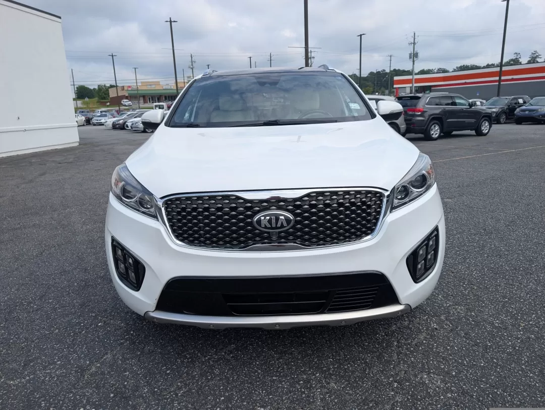 2017 /Satin Black Kia Sorento SXL V6 (5XYPK4A59HG) with an Other engine, located at 3959 U.S. 80 W, Phenix City, AL, 36870, (334) 297-4885, 32.469296, -85.135185 - Are you ready to elevate your family adventures or daily commutes with a vehicle that strikes the perfect balance between comfort, style, and reliability? Look no further than this stunning 2017 Kia Sorento SXL V6, now available at Gils Auto in Phenix City, AL. Whether you're navigating the bustling - Photo#1