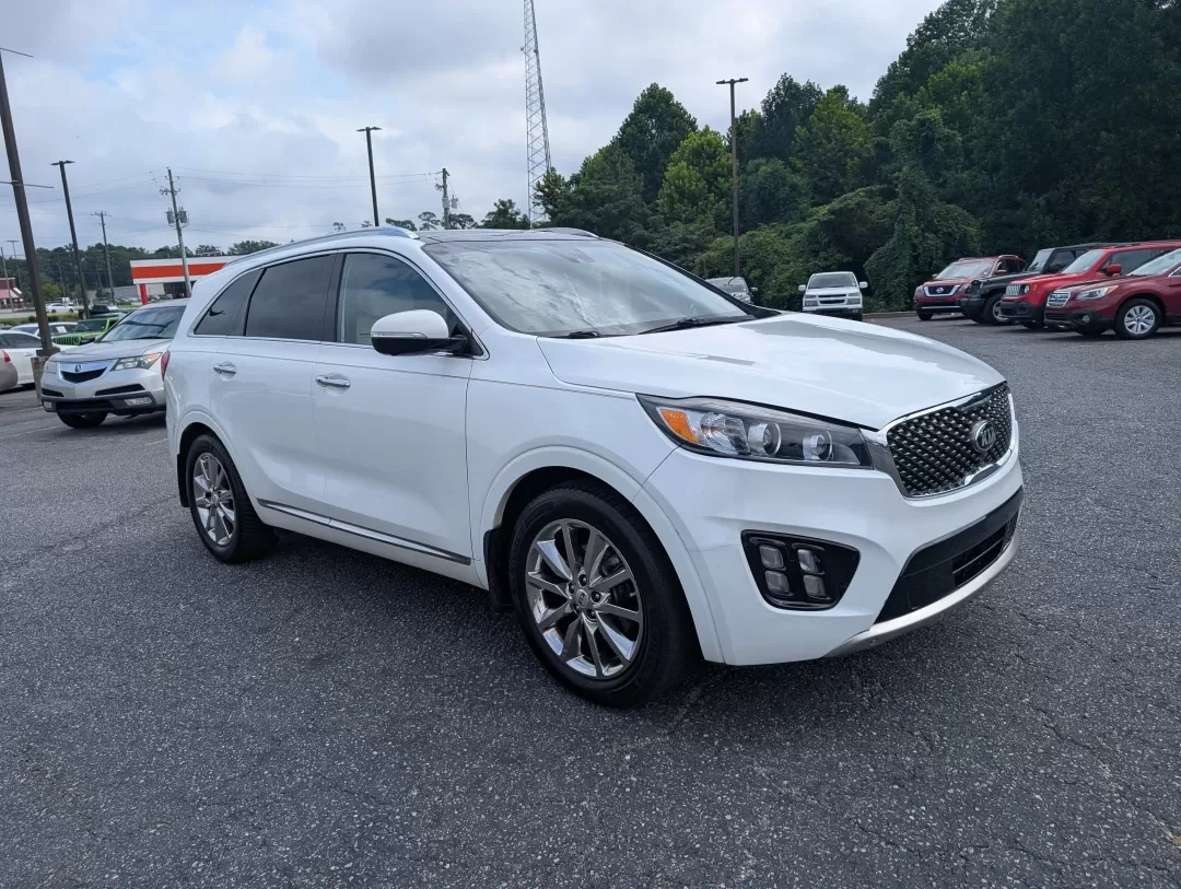 2017 /Satin Black Kia Sorento SXL V6 (5XYPK4A59HG) with an Other engine, located at 3959 U.S. 80 W, Phenix City, AL, 36870, (334) 297-4885, 32.469296, -85.135185 - Are you ready to elevate your family adventures or daily commutes with a vehicle that strikes the perfect balance between comfort, style, and reliability? Look no further than this stunning 2017 Kia Sorento SXL V6, now available at Gils Auto in Phenix City, AL. Whether you're navigating the bustling - Photo#2