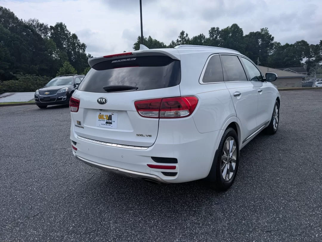 2017 /Satin Black Kia Sorento SXL V6 (5XYPK4A59HG) with an Other engine, located at 3959 U.S. 80 W, Phenix City, AL, 36870, (334) 297-4885, 32.469296, -85.135185 - Are you ready to elevate your family adventures or daily commutes with a vehicle that strikes the perfect balance between comfort, style, and reliability? Look no further than this stunning 2017 Kia Sorento SXL V6, now available at Gils Auto in Phenix City, AL. Whether you're navigating the bustling - Photo#4