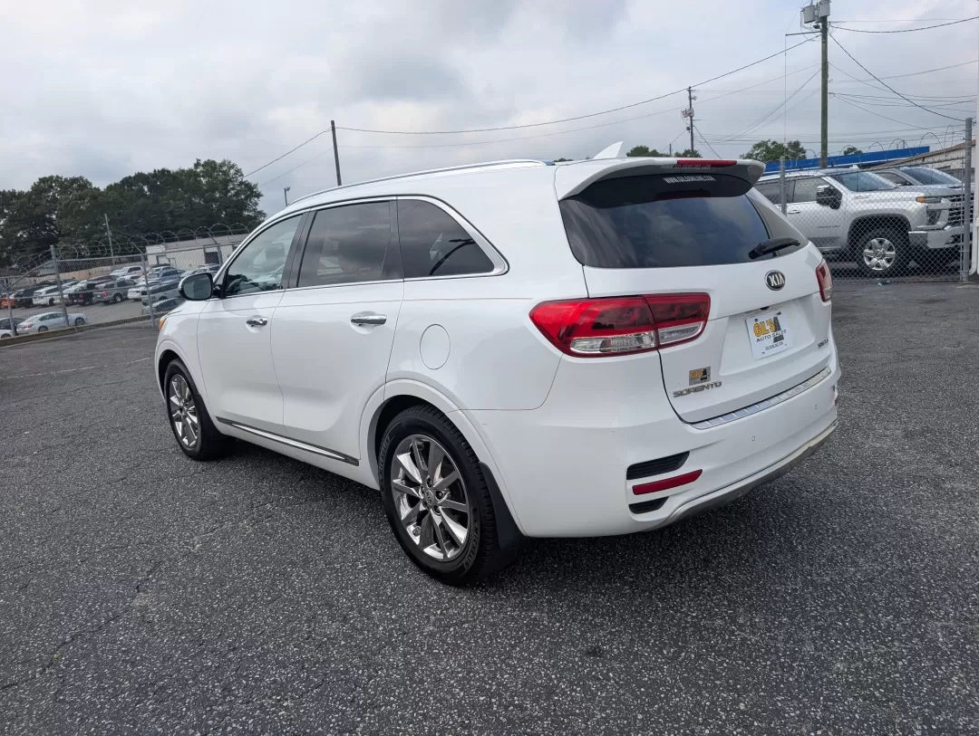 2017 /Satin Black Kia Sorento SXL V6 (5XYPK4A59HG) with an Other engine, located at 3959 U.S. 80 W, Phenix City, AL, 36870, (334) 297-4885, 32.469296, -85.135185 - Are you ready to elevate your family adventures or daily commutes with a vehicle that strikes the perfect balance between comfort, style, and reliability? Look no further than this stunning 2017 Kia Sorento SXL V6, now available at Gils Auto in Phenix City, AL. Whether you're navigating the bustling - Photo#6