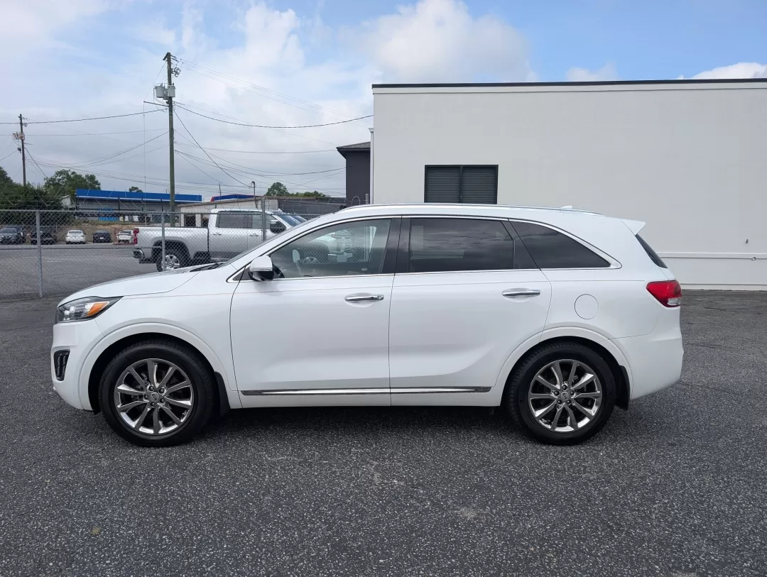 2017 /Satin Black Kia Sorento SXL V6 (5XYPK4A59HG) with an Other engine, located at 3959 U.S. 80 W, Phenix City, AL, 36870, (334) 297-4885, 32.469296, -85.135185 - Are you ready to elevate your family adventures or daily commutes with a vehicle that strikes the perfect balance between comfort, style, and reliability? Look no further than this stunning 2017 Kia Sorento SXL V6, now available at Gils Auto in Phenix City, AL. Whether you're navigating the bustling - Photo#7