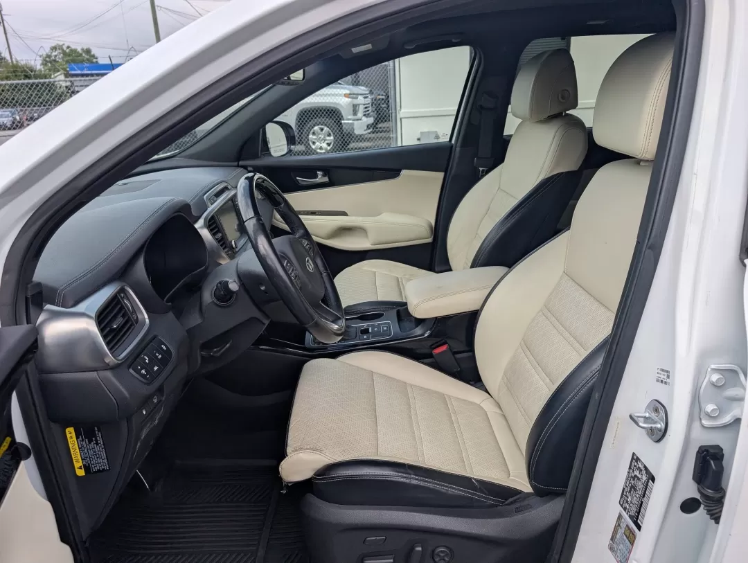 2017 /Satin Black Kia Sorento SXL V6 (5XYPK4A59HG) with an Other engine, located at 3959 U.S. 80 W, Phenix City, AL, 36870, (334) 297-4885, 32.469296, -85.135185 - Are you ready to elevate your family adventures or daily commutes with a vehicle that strikes the perfect balance between comfort, style, and reliability? Look no further than this stunning 2017 Kia Sorento SXL V6, now available at Gils Auto in Phenix City, AL. Whether you're navigating the bustling - Photo#9