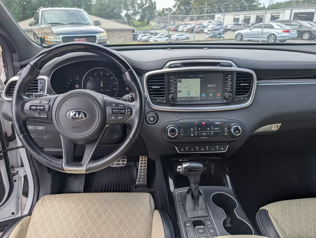 2017 /Satin Black Kia Sorento SXL V6 (5XYPK4A59HG) with an Other engine, located at 3959 U.S. 80 W, Phenix City, AL, 36870, (334) 297-4885, 32.469296, -85.135185 - Are you ready to elevate your family adventures or daily commutes with a vehicle that strikes the perfect balance between comfort, style, and reliability? Look no further than this stunning 2017 Kia Sorento SXL V6, now available at Gils Auto in Phenix City, AL. Whether you're navigating the bustling - Photo#11