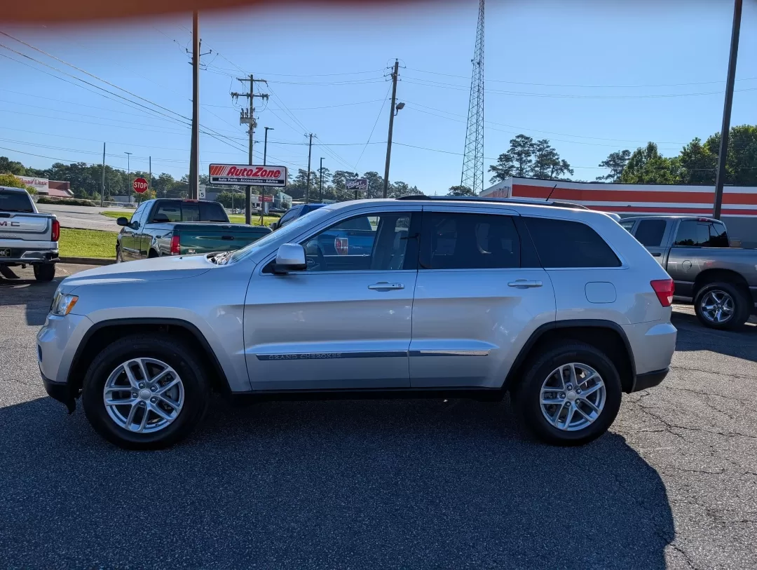 2011 /Dark Graystone/Medium Graystone Interior Jeep Grand Cherokee Laredo (1J4RS4GG3BC) with an Other engine, located at 3959 U.S. 80 W, Phenix City, AL, 36870, (334) 297-4885, 32.469296, -85.135185 - ### Explore the Open Road with the 2011 Jeep Grand Cherokee Laredo at Gils Auto!<br /> <br /> Are you ready for weekend adventures, family road trips, or simply an everyday reliable ride? Look no further! The **2011 Jeep Grand Cherokee Laredo** is the ultimate SUV that blends luxury, performance, an - Photo#7