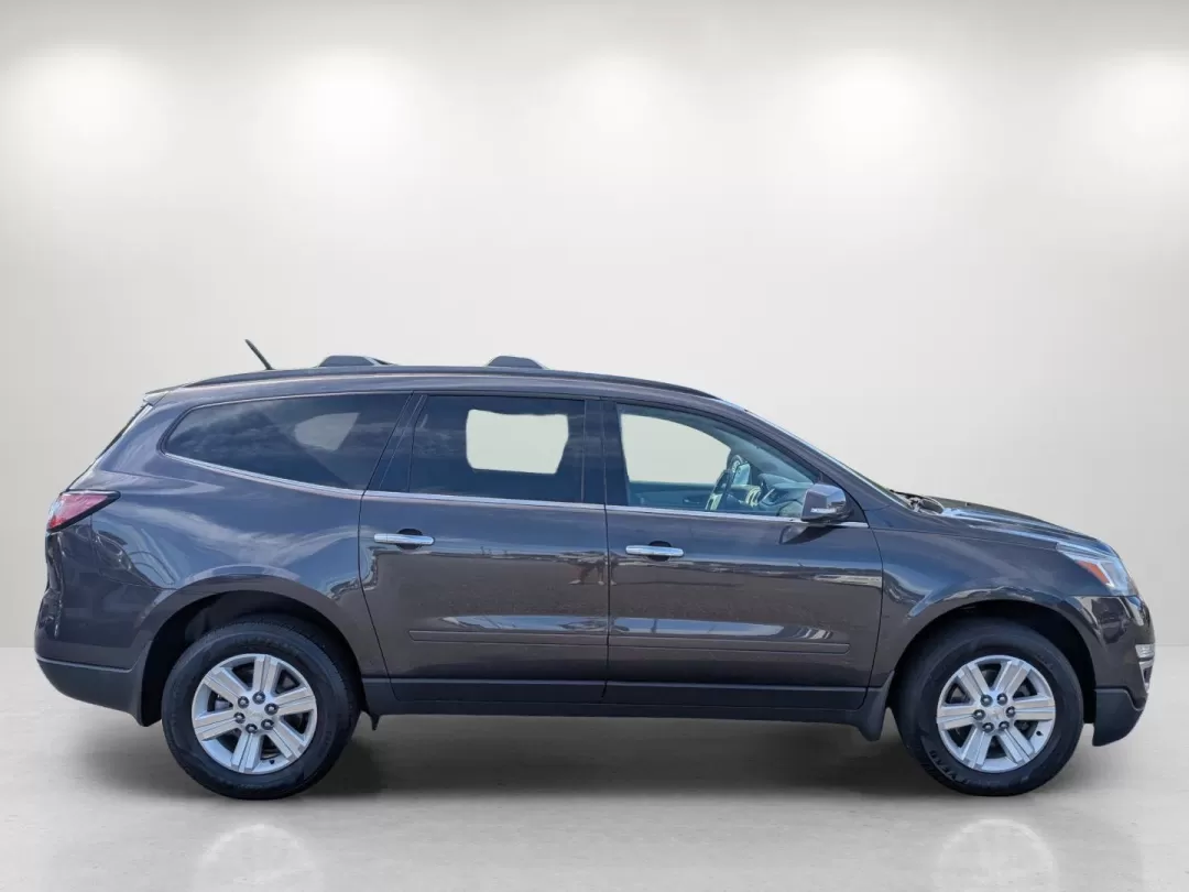2014 /Dk Titanium/Lt Titanium Chevrolet Traverse LT (1GNKRGKD1EJ) with an Other engine, located at 804 22nd Ave, Phenix City, AL, 36870, (334) 297-1860, 32.484749, -85.024475 - Are you searching for the perfect family SUV that combines comfort, reliability, and affordability? Look no further than this stunning 2014 Chevrolet Traverse LT, now available at Gils Auto in Phenix City, AL. Ideal for growing families or anyone who enjoys weekend adventures, this versatile vehicle - Photo#3