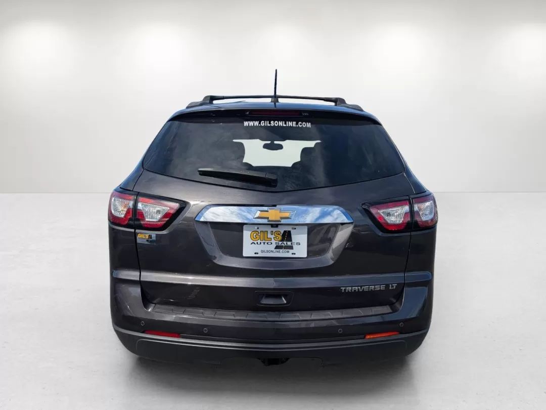 2014 /Dk Titanium/Lt Titanium Chevrolet Traverse LT (1GNKRGKD1EJ) with an Other engine, located at 804 22nd Ave, Phenix City, AL, 36870, (334) 297-1860, 32.484749, -85.024475 - Are you searching for the perfect family SUV that combines comfort, reliability, and affordability? Look no further than this stunning 2014 Chevrolet Traverse LT, now available at Gils Auto in Phenix City, AL. Ideal for growing families or anyone who enjoys weekend adventures, this versatile vehicle - Photo#5