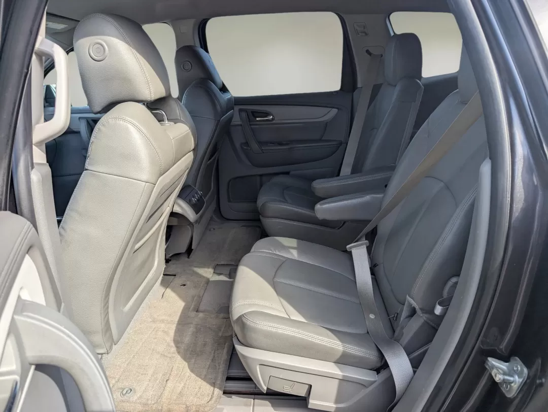2014 /Dk Titanium/Lt Titanium Chevrolet Traverse LT (1GNKRGKD1EJ) with an Other engine, located at 804 22nd Ave, Phenix City, AL, 36870, (334) 297-1860, 32.484749, -85.024475 - Are you searching for the perfect family SUV that combines comfort, reliability, and affordability? Look no further than this stunning 2014 Chevrolet Traverse LT, now available at Gils Auto in Phenix City, AL. Ideal for growing families or anyone who enjoys weekend adventures, this versatile vehicle - Photo#9