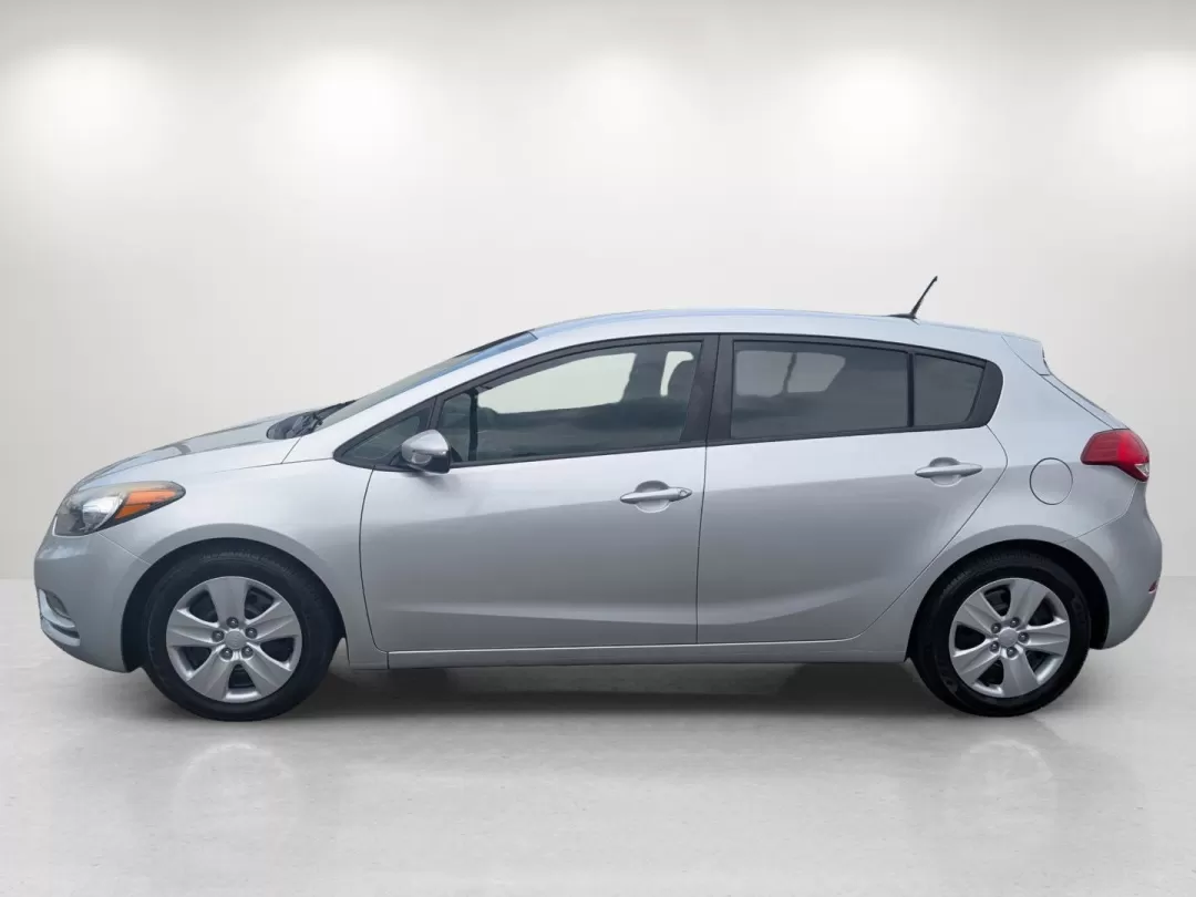 2016 /Black Kia Forte 5-Door LX (KNAFK5A80G5) with an Other engine, located at 3959 U.S. 80 W, Phenix City, AL, 36870, (334) 297-4885, 32.469296, -85.135185 - Are you ready to elevate your daily drives and discover a vehicle that perfectly balances style, comfort, and practicality? Look no further than this 2016 Kia Forte 5-Door LX, a fantastic choice for budget-conscious buyers and those seeking reliable transportation. With its sleek Silky Silver exteri - Photo#8