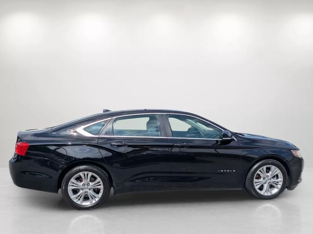 2014 /Jet Black Chevrolet Impala LT (2G1125S36E9) with an Other engine, located at 3959 U.S. 80 W, Phenix City, AL, 36870, (334) 297-4885, 32.469296, -85.135185 - Experience the perfect blend of comfort, style, and performance with this outstanding 2014 Chevrolet Impala LT, available at Gils Auto in Phenix City, AL. Whether you're commuting to work, running errands, or planning a weekend getaway, this sedan is tailored to enhance every journey. With its sleek - Photo#4