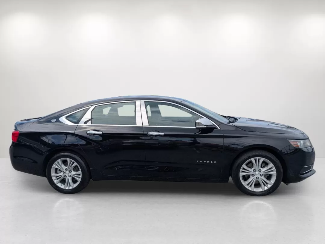 2014 /Jet Black Chevrolet Impala LT (1G1125S32EU) with an Other engine, located at 3959 U.S. 80 W, Phenix City, AL, 36870, (334) 297-4885, 32.469296, -85.135185 - Experience the perfect blend of comfort, style, and technology with this stunning 2014 Chevrolet Impala LT, now available at Gils Auto in Phenix City, AL. Whether you're commuting to work, taking the family on weekend adventures, or simply running errands around town, this sedan brings a level of so - Photo#3