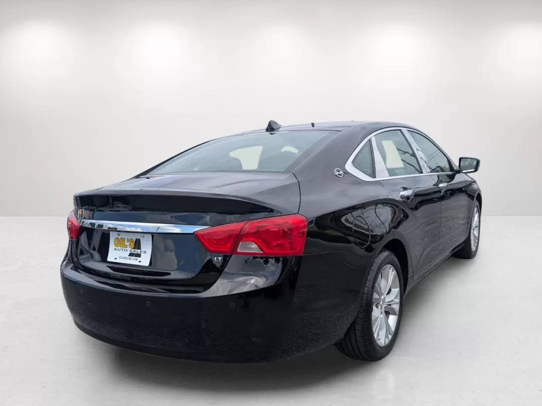 2014 /Jet Black Chevrolet Impala LT (1G1125S32EU) with an Other engine, located at 3959 U.S. 80 W, Phenix City, AL, 36870, (334) 297-4885, 32.469296, -85.135185 - Experience the perfect blend of comfort, style, and technology with this stunning 2014 Chevrolet Impala LT, now available at Gils Auto in Phenix City, AL. Whether you're commuting to work, taking the family on weekend adventures, or simply running errands around town, this sedan brings a level of so - Photo#4