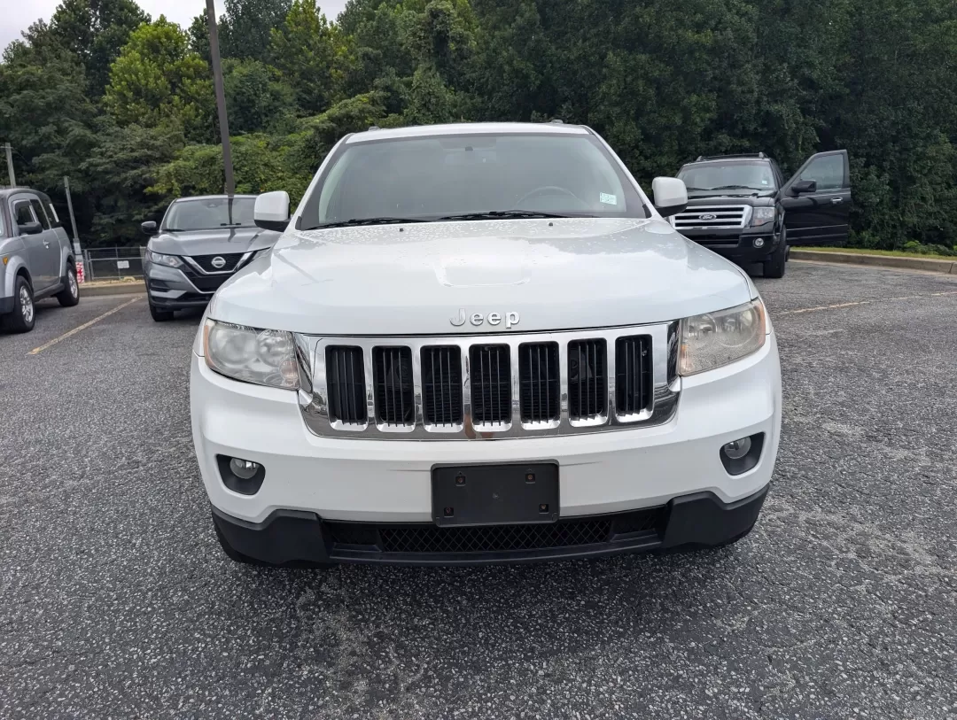2013 /Black Jeep Grand Cherokee Laredo (1C4RJFAG6DC) with an Other engine, located at 3959 U.S. 80 W, Phenix City, AL, 36870, (334) 297-4885, 32.469296, -85.135185 - **Experience Adventure with the 2013 Jeep Grand Cherokee Laredo at Gils Auto!**<br /> <br /> Are you ready to elevate your adventures with a vehicle that can handle everything life throws your way? Look no further than the 2013 Jeep Grand Cherokee Laredo, available now at Gils Auto in Phenix City, A - Photo#1