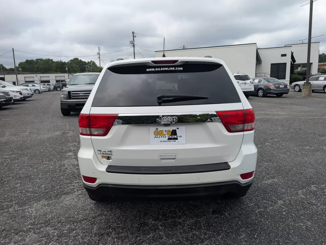 2013 /Black Jeep Grand Cherokee Laredo (1C4RJFAG6DC) with an Other engine, located at 3959 U.S. 80 W, Phenix City, AL, 36870, (334) 297-4885, 32.469296, -85.135185 - **Experience Adventure with the 2013 Jeep Grand Cherokee Laredo at Gils Auto!**<br /> <br /> Are you ready to elevate your adventures with a vehicle that can handle everything life throws your way? Look no further than the 2013 Jeep Grand Cherokee Laredo, available now at Gils Auto in Phenix City, A - Photo#5