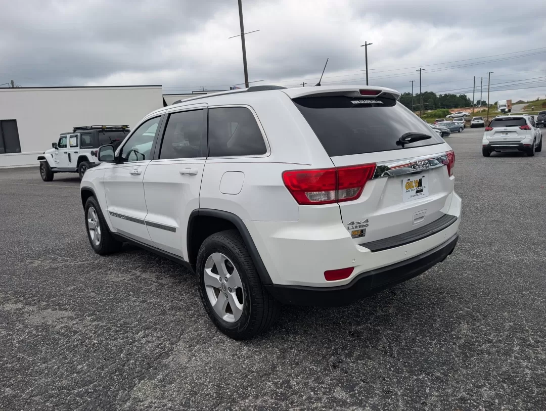2013 /Black Jeep Grand Cherokee Laredo (1C4RJFAG6DC) with an Other engine, located at 3959 U.S. 80 W, Phenix City, AL, 36870, (334) 297-4885, 32.469296, -85.135185 - **Experience Adventure with the 2013 Jeep Grand Cherokee Laredo at Gils Auto!**<br /> <br /> Are you ready to elevate your adventures with a vehicle that can handle everything life throws your way? Look no further than the 2013 Jeep Grand Cherokee Laredo, available now at Gils Auto in Phenix City, A - Photo#6