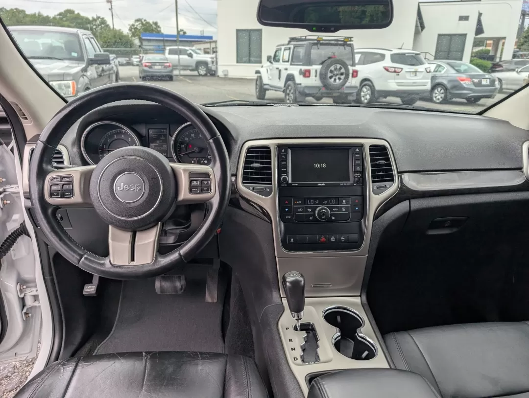 2013 /Black Jeep Grand Cherokee Laredo (1C4RJFAG6DC) with an Other engine, located at 3959 U.S. 80 W, Phenix City, AL, 36870, (334) 297-4885, 32.469296, -85.135185 - **Experience Adventure with the 2013 Jeep Grand Cherokee Laredo at Gils Auto!**<br /> <br /> Are you ready to elevate your adventures with a vehicle that can handle everything life throws your way? Look no further than the 2013 Jeep Grand Cherokee Laredo, available now at Gils Auto in Phenix City, A - Photo#11