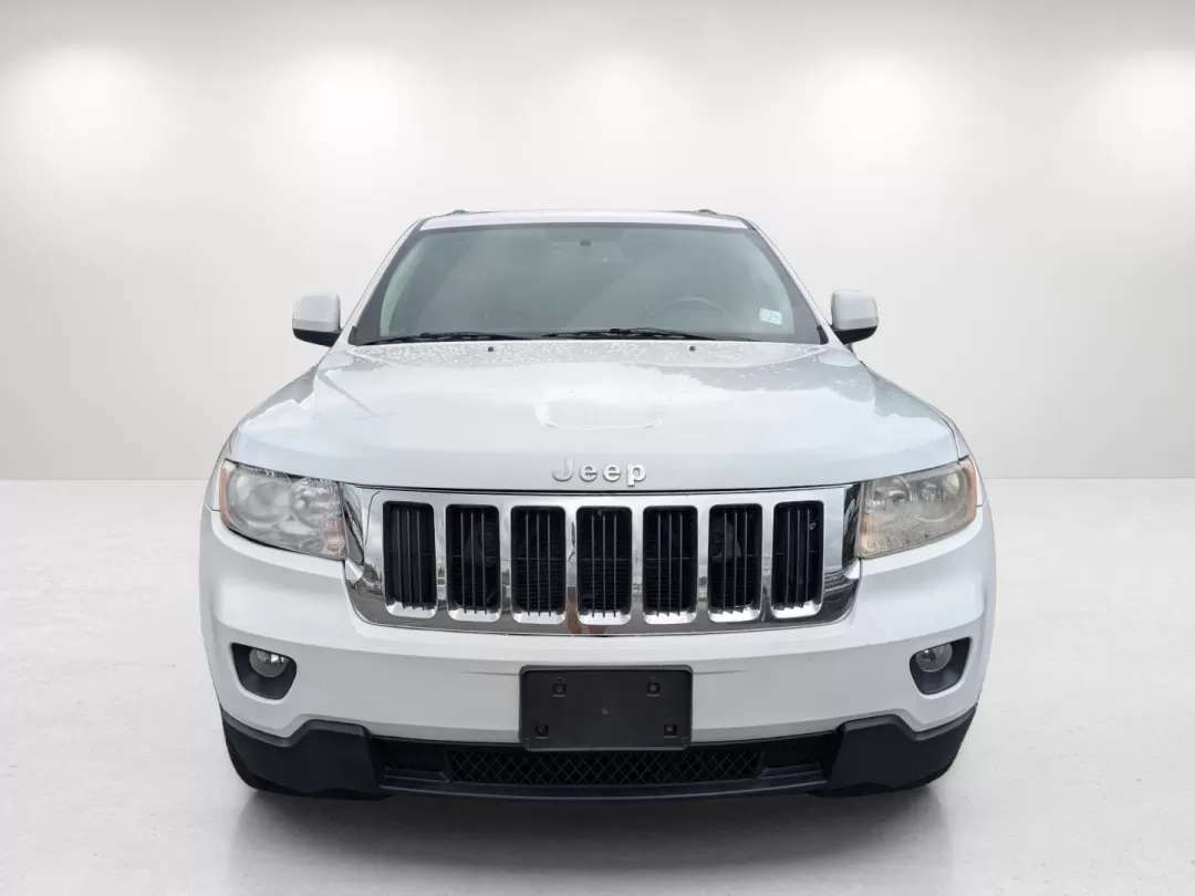 2013 /Black Jeep Grand Cherokee Laredo (1C4RJFAG6DC) with an Other engine, located at 3959 U.S. 80 W, Phenix City, AL, 36870, (334) 297-4885, 32.469296, -85.135185 - **Experience Adventure with the 2013 Jeep Grand Cherokee Laredo at Gils Auto!**<br /> <br /> Are you ready to elevate your adventures with a vehicle that can handle everything life throws your way? Look no further than the 2013 Jeep Grand Cherokee Laredo, available now at Gils Auto in Phenix City, A - Photo#2