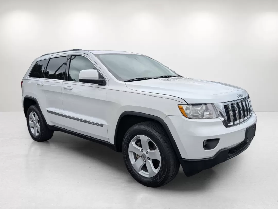 2013 /Black Jeep Grand Cherokee Laredo (1C4RJFAG6DC) with an Other engine, located at 3959 U.S. 80 W, Phenix City, AL, 36870, (334) 297-4885, 32.469296, -85.135185 - **Experience Adventure with the 2013 Jeep Grand Cherokee Laredo at Gils Auto!**<br /> <br /> Are you ready to elevate your adventures with a vehicle that can handle everything life throws your way? Look no further than the 2013 Jeep Grand Cherokee Laredo, available now at Gils Auto in Phenix City, A - Photo#3