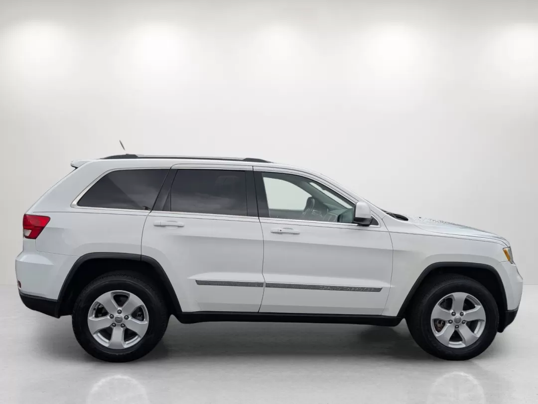 2013 /Black Jeep Grand Cherokee Laredo (1C4RJFAG6DC) with an Other engine, located at 3959 U.S. 80 W, Phenix City, AL, 36870, (334) 297-4885, 32.469296, -85.135185 - **Experience Adventure with the 2013 Jeep Grand Cherokee Laredo at Gils Auto!**<br /> <br /> Are you ready to elevate your adventures with a vehicle that can handle everything life throws your way? Look no further than the 2013 Jeep Grand Cherokee Laredo, available now at Gils Auto in Phenix City, A - Photo#4