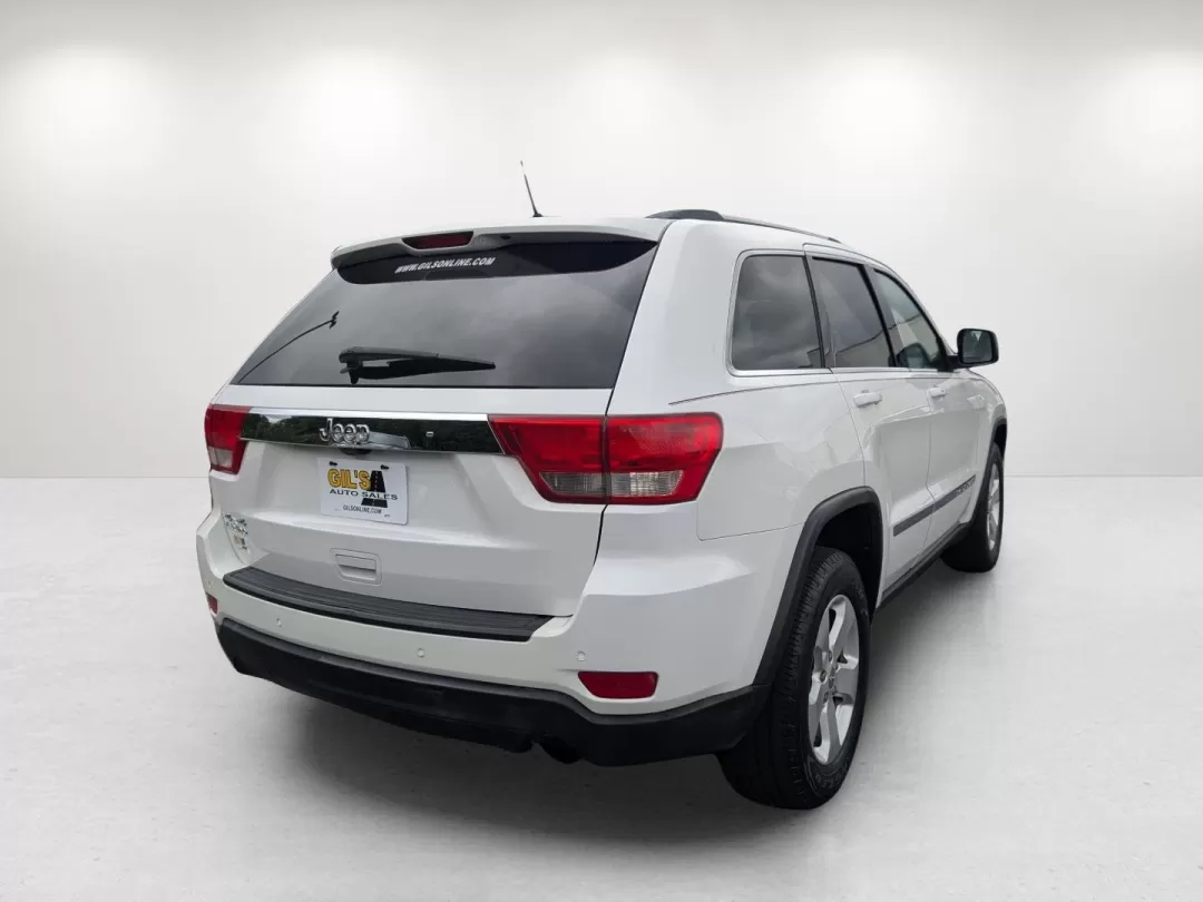 2013 /Black Jeep Grand Cherokee Laredo (1C4RJFAG6DC) with an Other engine, located at 3959 U.S. 80 W, Phenix City, AL, 36870, (334) 297-4885, 32.469296, -85.135185 - **Experience Adventure with the 2013 Jeep Grand Cherokee Laredo at Gils Auto!**<br /> <br /> Are you ready to elevate your adventures with a vehicle that can handle everything life throws your way? Look no further than the 2013 Jeep Grand Cherokee Laredo, available now at Gils Auto in Phenix City, A - Photo#5
