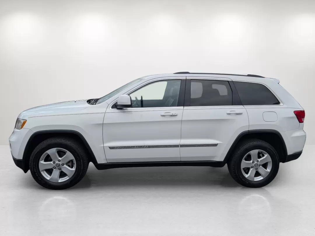 2013 /Black Jeep Grand Cherokee Laredo (1C4RJFAG6DC) with an Other engine, located at 3959 U.S. 80 W, Phenix City, AL, 36870, (334) 297-4885, 32.469296, -85.135185 - **Experience Adventure with the 2013 Jeep Grand Cherokee Laredo at Gils Auto!**<br /> <br /> Are you ready to elevate your adventures with a vehicle that can handle everything life throws your way? Look no further than the 2013 Jeep Grand Cherokee Laredo, available now at Gils Auto in Phenix City, A - Photo#8