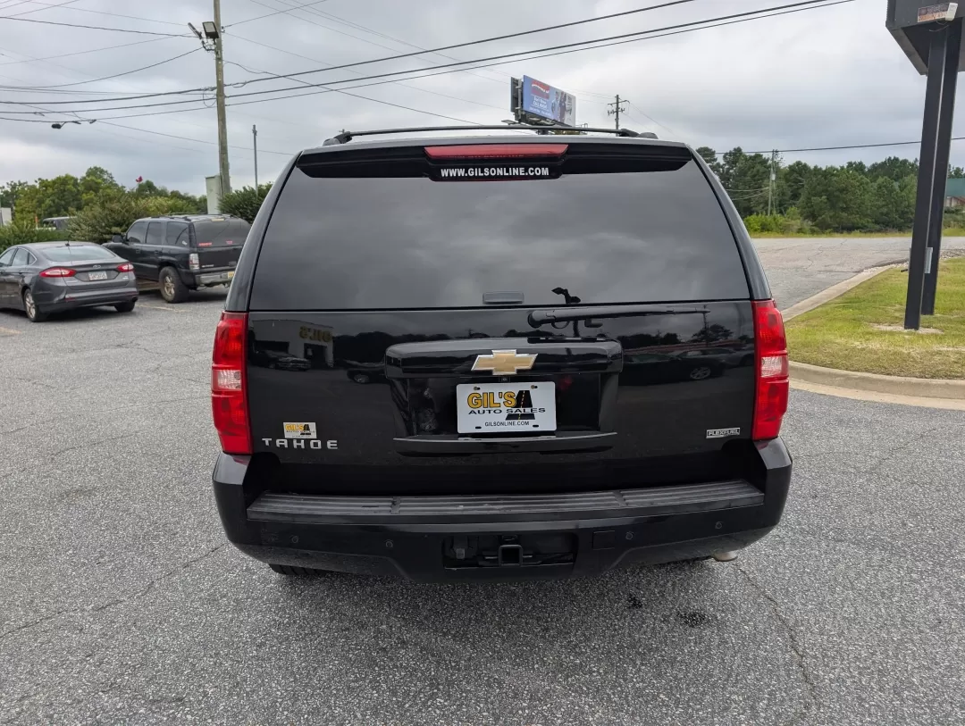 2011 /Ebony Chevrolet Tahoe LS (1GNSCAE06BR) with an Other engine, located at 3959 U.S. 80 W, Phenix City, AL, 36870, (334) 297-4885, 32.469296, -85.135185 - Imagine effortlessly navigating through Phenix City, AL, in a robust 2011 Chevrolet Tahoe, perfect for family road trips or weekend adventures. With its spacious interior and impressive towing capacity, this SUV is designed for those who value both comfort and capability. Whether you're hauling spor - Photo#5