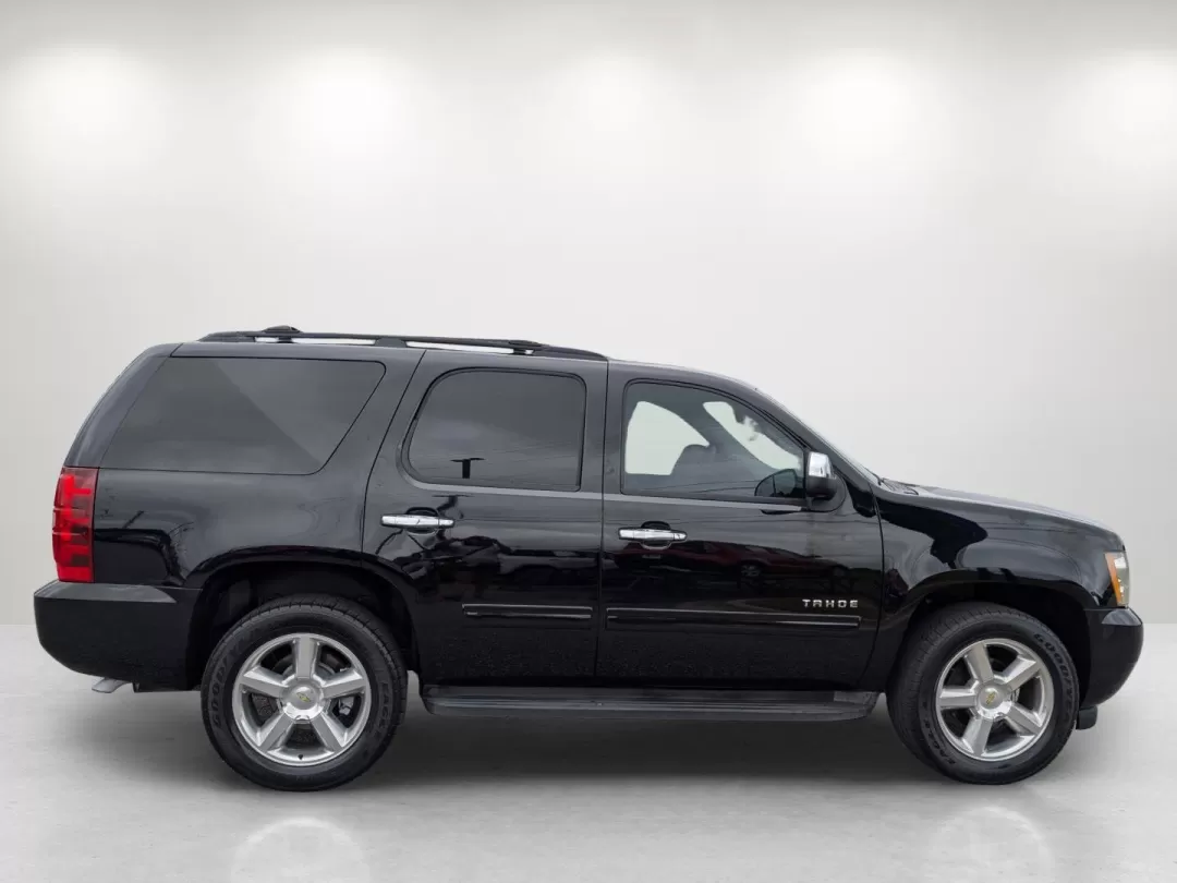 2011 /Ebony Chevrolet Tahoe LS (1GNSCAE06BR) with an Other engine, located at 3959 U.S. 80 W, Phenix City, AL, 36870, (334) 297-4885, 32.469296, -85.135185 - Imagine effortlessly navigating through Phenix City, AL, in a robust 2011 Chevrolet Tahoe, perfect for family road trips or weekend adventures. With its spacious interior and impressive towing capacity, this SUV is designed for those who value both comfort and capability. Whether you're hauling spor - Photo#4