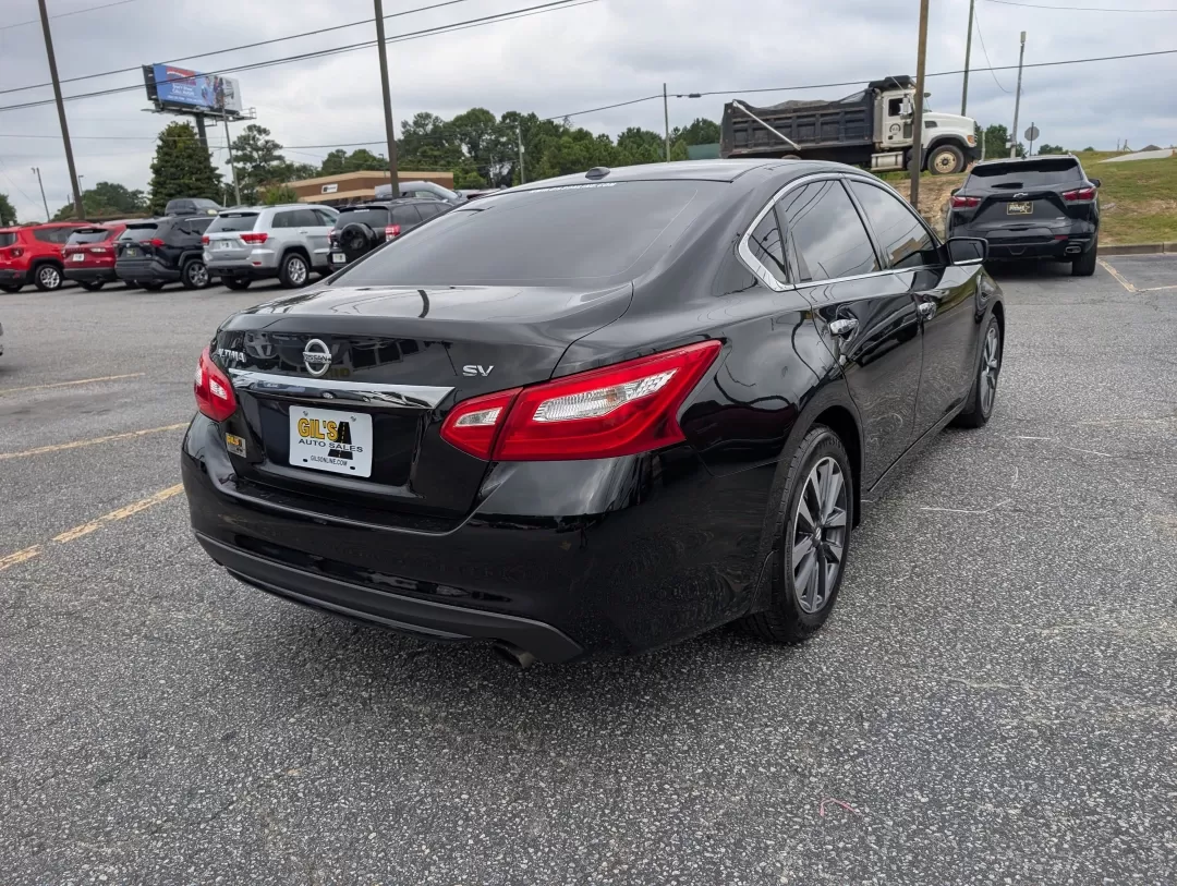 2016 /Charcoal Nissan Altima 2.5 SV (1N4AL3AP2GC) with an Other engine, located at 3959 U.S. 80 W, Phenix City, AL, 36870, (334) 297-4885, 32.469296, -85.135185 - Looking for a reliable and stylish sedan that fits seamlessly into your busy lifestyle? Look no further than this stunning 2016 Nissan Altima 2.5 SV, perfect for daily commutes, family outings, or weekend getaways. With its sleek Super Black exterior and comfortable charcoal cloth interior, this veh - Photo#4