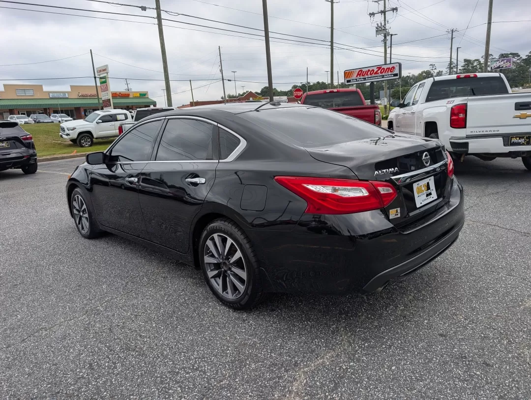 2016 /Charcoal Nissan Altima 2.5 SV (1N4AL3AP2GC) with an Other engine, located at 3959 U.S. 80 W, Phenix City, AL, 36870, (334) 297-4885, 32.469296, -85.135185 - Looking for a reliable and stylish sedan that fits seamlessly into your busy lifestyle? Look no further than this stunning 2016 Nissan Altima 2.5 SV, perfect for daily commutes, family outings, or weekend getaways. With its sleek Super Black exterior and comfortable charcoal cloth interior, this veh - Photo#6