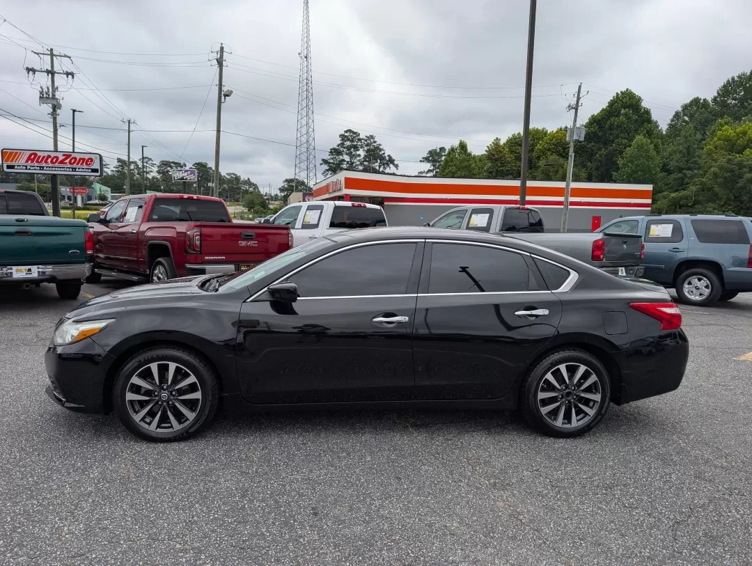 2016 /Charcoal Nissan Altima 2.5 SV (1N4AL3AP2GC) with an Other engine, located at 3959 U.S. 80 W, Phenix City, AL, 36870, (334) 297-4885, 32.469296, -85.135185 - Looking for a reliable and stylish sedan that fits seamlessly into your busy lifestyle? Look no further than this stunning 2016 Nissan Altima 2.5 SV, perfect for daily commutes, family outings, or weekend getaways. With its sleek Super Black exterior and comfortable charcoal cloth interior, this veh - Photo#7