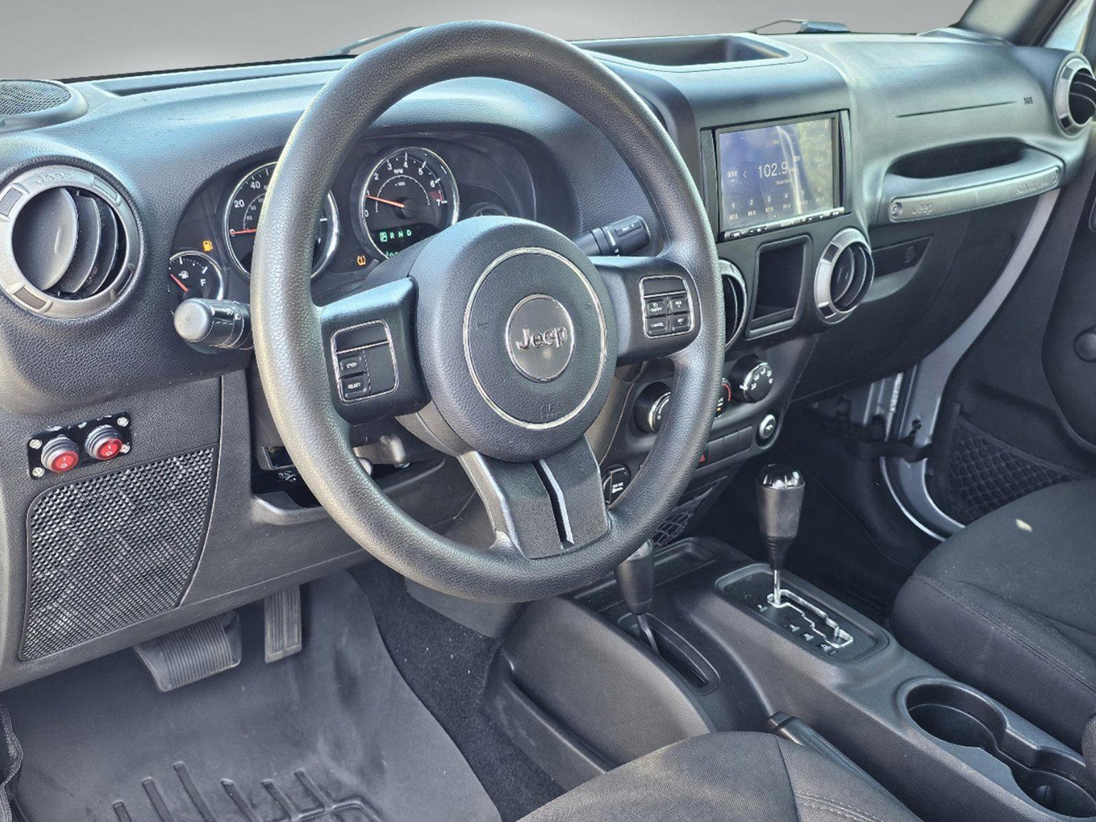 2015 Billet Silver Metallic Clearcoat /Black Jeep Wrangler Sport (1C4AJWAG2FL) with an Regular Unleaded V-6 3.6 L/220 engine, 5-Speed Automatic w/OD transmission, located at 5115 14th Ave., Columbus, GA, 31904, (706) 323-0345, 32.511494, -84.971046 - 2015 Jeep Wrangler Sport - Photo#12