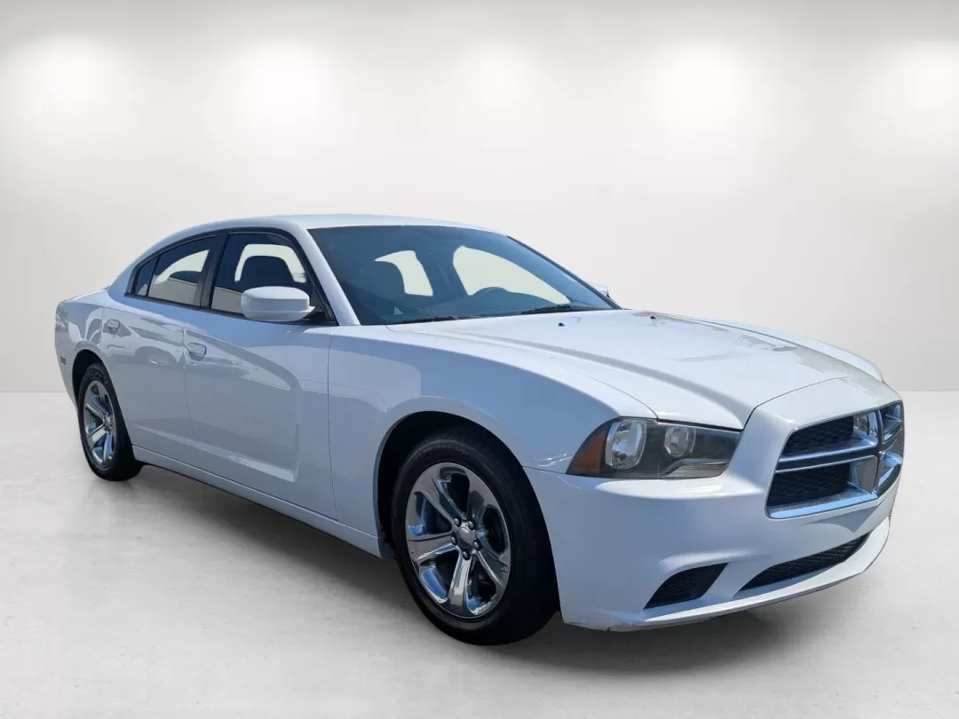 2013 /Black/Light Frost Beige Interior Dodge Charger SE (2C3CDXBG7DH) with an Other engine, located at 5115 14th Ave., Columbus, GA, 31904, (706) 323-0345, 32.511494, -84.971046 - **Unleash Your Inner Adventurer with the 2013 Dodge Charger SE!**<br /> <br /> Are you ready to elevate your driving experience? The 2013 Dodge Charger SE is not just a vehicle; it's a lifestyle upgrade! Imagine cruising down the streets of Phenix City, AL, in style with your family or friends, enjo - Photo#2