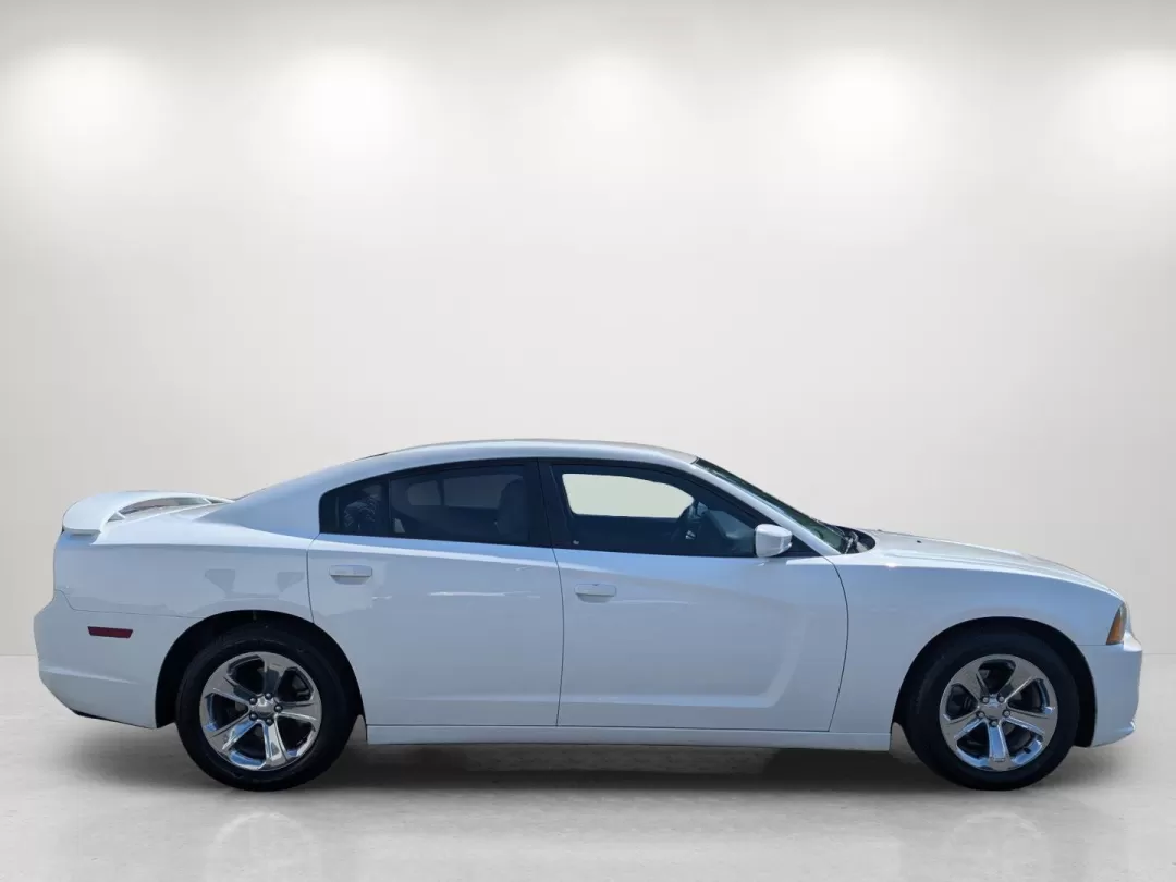 2013 /Black/Light Frost Beige Interior Dodge Charger SE (2C3CDXBG7DH) with an Other engine, located at 5115 14th Ave., Columbus, GA, 31904, (706) 323-0345, 32.511494, -84.971046 - **Unleash Your Inner Adventurer with the 2013 Dodge Charger SE!**<br /> <br /> Are you ready to elevate your driving experience? The 2013 Dodge Charger SE is not just a vehicle; it's a lifestyle upgrade! Imagine cruising down the streets of Phenix City, AL, in style with your family or friends, enjo - Photo#3