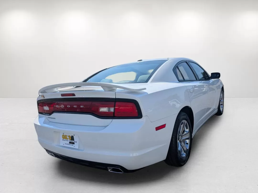 2013 /Black/Light Frost Beige Interior Dodge Charger SE (2C3CDXBG7DH) with an Other engine, located at 5115 14th Ave., Columbus, GA, 31904, (706) 323-0345, 32.511494, -84.971046 - **Unleash Your Inner Adventurer with the 2013 Dodge Charger SE!**<br /> <br /> Are you ready to elevate your driving experience? The 2013 Dodge Charger SE is not just a vehicle; it's a lifestyle upgrade! Imagine cruising down the streets of Phenix City, AL, in style with your family or friends, enjo - Photo#4
