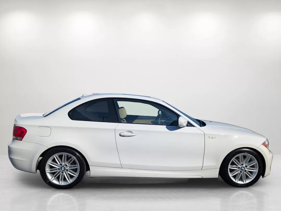 2013 BMW 1 Series 128i (WBAUP7C5XDV) with an Other engine, located at 1430 Gateway Drive, Opelika, AL, 36801, (334) 239-0944, 32.637871, -85.409790 - 2013 BMW 1 Series 128i - Photo#3